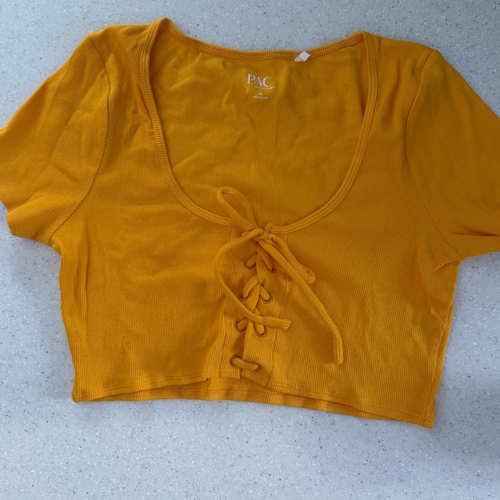 NWOT Medium PAC Sun PAC Cares orange Crop Top. scoop Neck. Tie-Front Crop Top